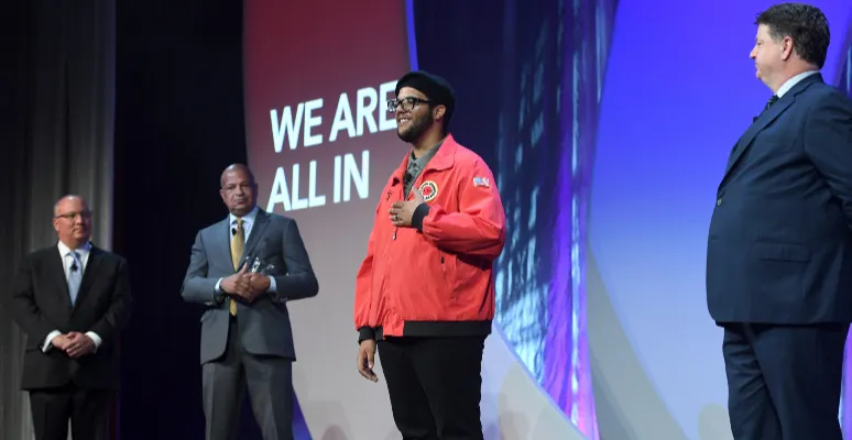 City Year Corps Member, Cornelius Rhone, addresses the crowd at the 36th Annual Walter Kaitz Foundation Fundraising Dinner.